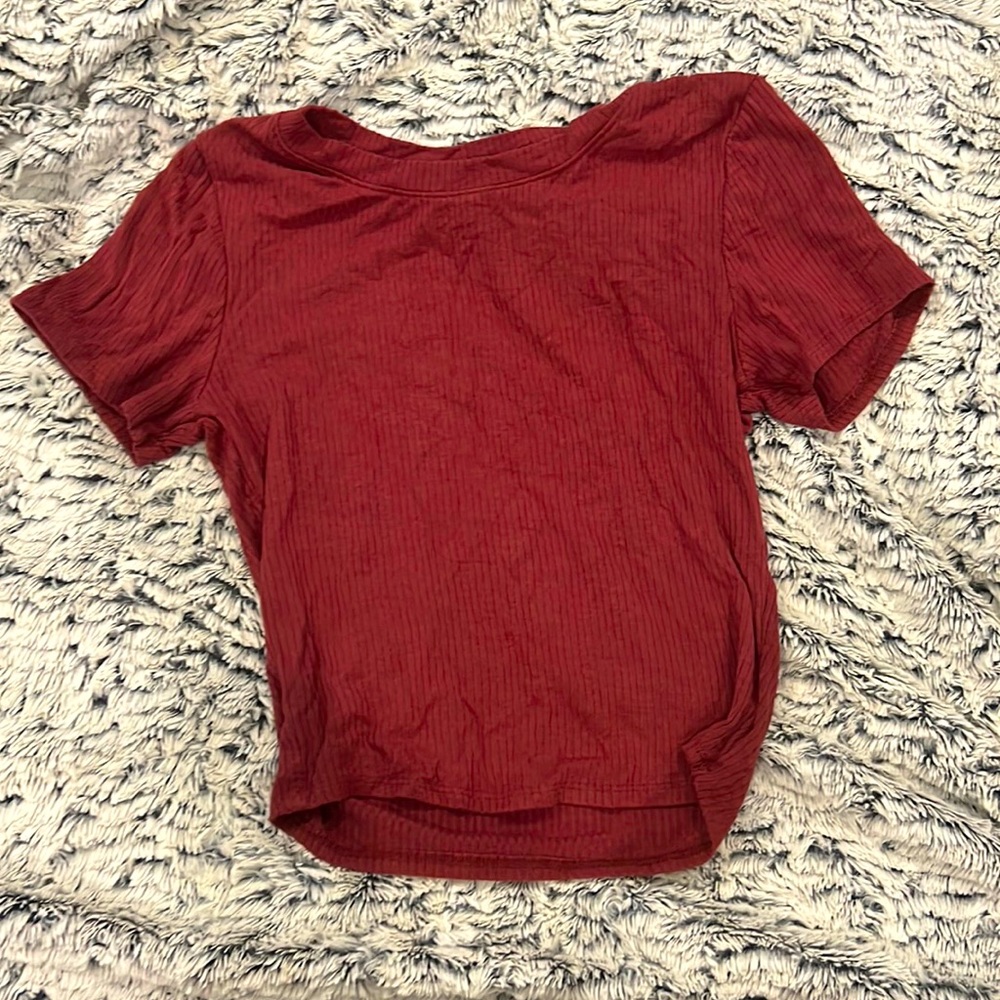 A burgundy crop top! Sized medium from Bozzolo. Very cute and light!